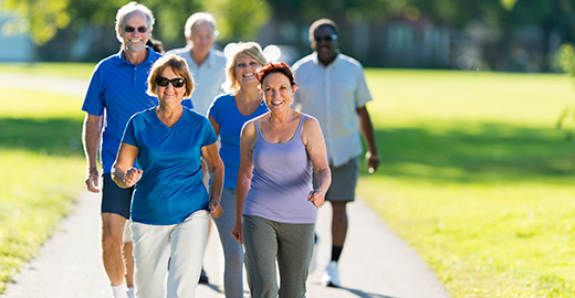 A group of seniors walking outdoors