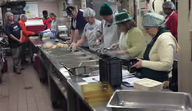 Packing up meals in a commercial kitchen
