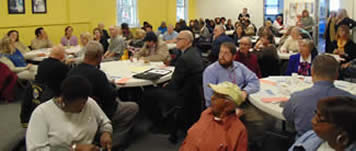 A crowd at a public hearing.