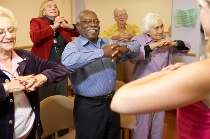 Senior adults in a stretching class