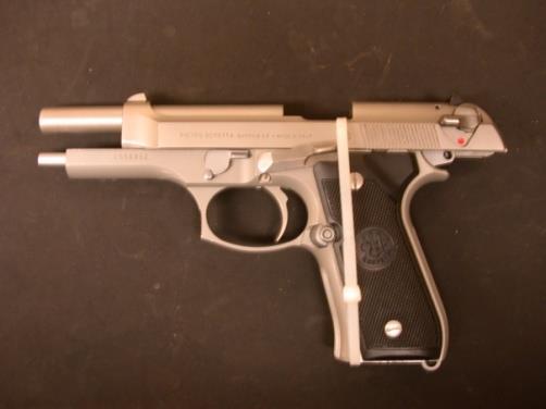 Pistol with Zip tie for safety, Firearms Evidence Packaging 4